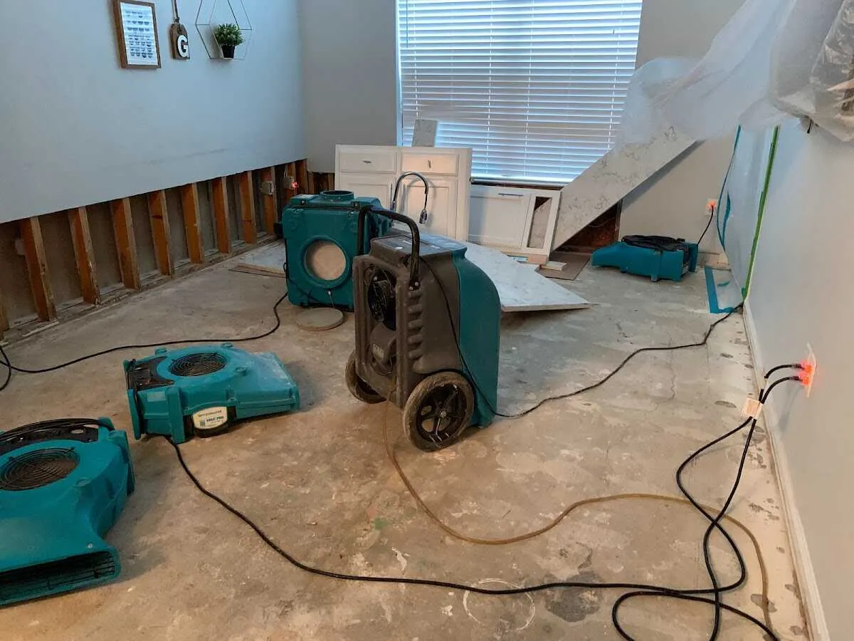 Dehumidifier in flood-cut room for Water Damage Restoration in Bonita